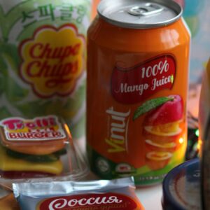 Sodas in Cans and Chocolate Bar